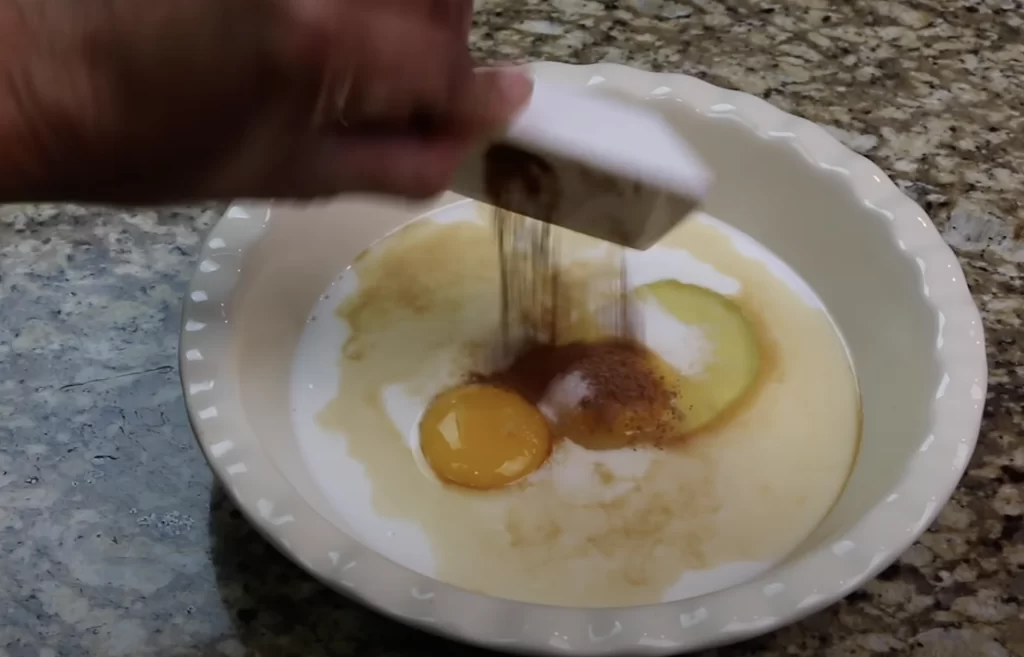 adding the nutmeg and cinnamon for French Toast Recipe